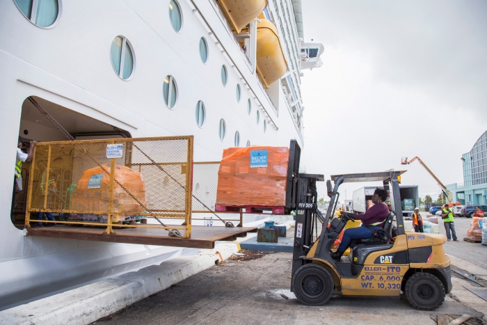 Supplies are loaded onto Royal Caribbean International's Adventure of the Seas ahead of the ship's return to San Juan on Oct. 6, Tuesday, Oct. 3, 2017 in Fort Lauderdale, Fla. The cruise line has delivered nearly one million cases of relief supplies to affected islands in the Caribbean. (Jesus Aranguren/AP Images for Royal Caribbean)