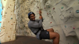 Dhani Jones Climbs Freedom of the Seas Rock Wall