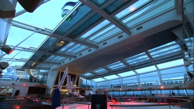 Poolside Bliss, Rain or Shine: Retractable Roof on Royal Caribbean's High-Tech Ship Ensures Fun for Guests