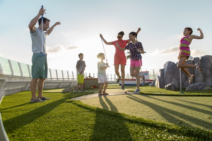 March 2016 - Guests onboard Liberty of the Seas get a chance to enjoy a new Caribbean themed mini putt putt golf course.