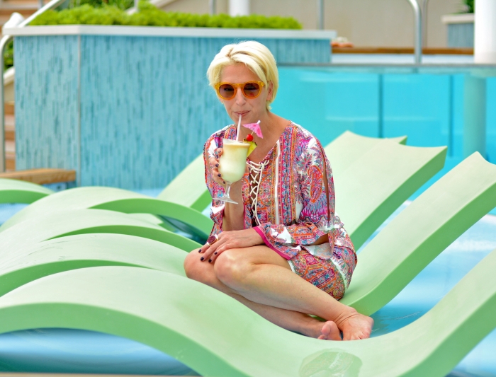 New York City’s favorite housewife, Dorinda Medley, enjoys some R&R with longtime love John Mahdessian onboard Royal Caribbean’s New-York-Harbor-based smartship Anthem of the Seas. The couple is enjoying a Caribbean getaway from the concrete jungle, and has been spotted taking in panoramic views from 300 feet above sea level in Anthem’s iconic North Star; riding bumper cars in SeaPlex, the largest indoor active space at sea; lounging poolside in the ship’s adults-only Solarium; and previewing the new Royal Suite Class, launching May 2016.