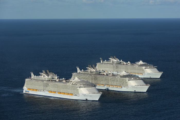 Royal Caribbean International’s Oasis-class ships, Oasis of the Seas, Allure of the Seas and the new Harmony of the Seas, struck a chord today, greeting each other at sea for the first and possibly only time. In a meeting of unprecedented proportions, the three record-breaking sisters came together to celebrate the U.S. arrival of Harmony of the Seas on the eve of the ship’s debut in her new permanent homeport of Port Everglades in Fort Lauderdale, Fla.
