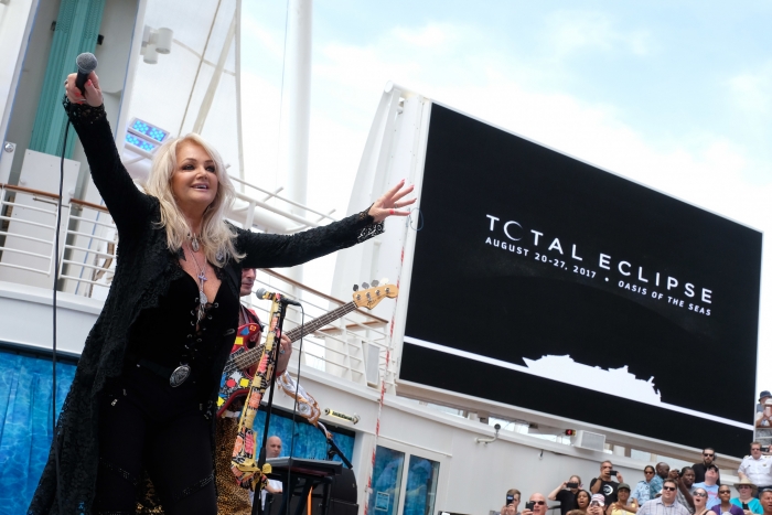 During the Great American Eclipse on Mon., Aug. 21, Royal Caribbean’s Oasis of the Seas was the only place on Earth to see legendary songstress Bonnie Tyler and multi-platinum-selling band DNCE perform a never-before-heard duet of the iconic ‘80s power ballad, “Total Eclipse of the Heart.” The duet was part of an exclusive concert in the ship’s signature outdoor AquaTheater, commemorating the cruise line’s once-in-a-lifetime Total Eclipse Cruise.