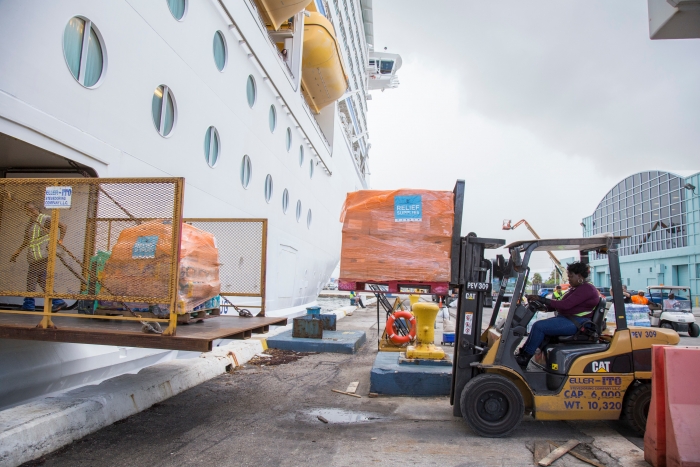 Royal Caribbean International's Adventure of the Seas returns to Port Everglades following a humanitarian relief cruise to the Caribbean. The cruise line worked with local government officials in Puerto Rico, St. Croix and St. Thomas to identify approximately 3,400 individuals for evacuation and to coordinate the delivery of emergency supplies. To date, Royal Caribbean has evacuated 8,000 people and employees, and delivered nearly one million cases of relief supplies to affected islands. Tuesday, Oct. 3, 2017 in Fort Lauderdale, Fla. (Jesus Aranguren/AP Images for Royal Caribbean)