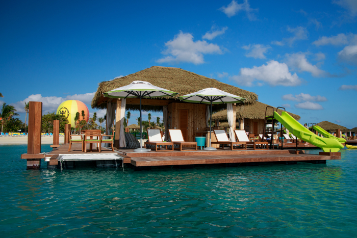 January 2020 – On deck – over the clear blue waters – at the new Coco Beach Club on Perfect Day at CocoCay are 20 floating cabanas, the first of their kind in The Bahamas. Bringing a bit of Bora Bora to the private island destination, each floating cabana features a private slide into the ocean, overwater hammock, dining area, freshwater shower, wet bar and an unbeatable ocean vista.