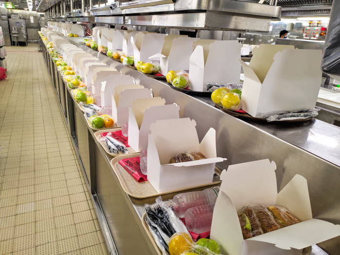 April 2021 – Crew members aboard Royal Caribbean’s Serenade of the Seas prepare provisions and stand at the ready to provide medical care for St. Vincent residents who are evacuating after the eruption of La Soufriere volcano.