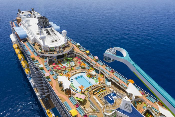 A bird’s-eye view of Odyssey of the Seas, the first of its kind to cruise from the U.S. when it sets sail from South Florida in July 2021. The new ship delivers something for everyone from bow to stern, with 12 all-new and first-to-brand experiences that span adventures, from a signature VR, bungee trampoline experience to glow-in-the-dark laser tag, restaurants with flavors from around the world, dedicated kids and teens programs, and more.