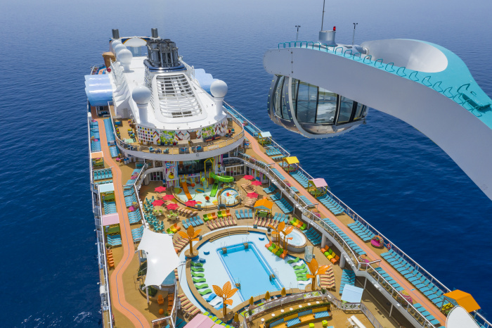 A bird’s-eye view of Odyssey of the Seas, the first of its kind to cruise from the U.S. when it sets sail from South Florida in July 2021. The new ship delivers something for everyone from bow to stern, with 12 all-new and first-to-brand experiences that span adventures, from a signature VR, bungee trampoline experience to glow-in-the-dark laser tag, restaurants with flavors from around the world, dedicated kids and teens programs, and more.