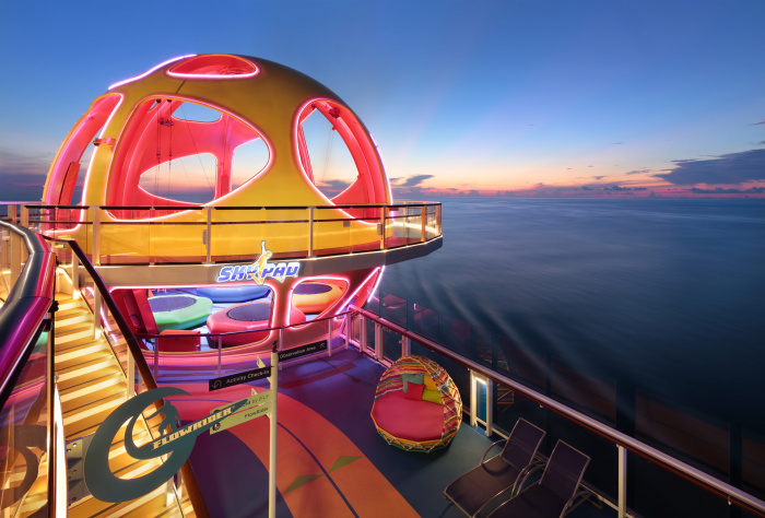 Sky Pad on board Odyssey of the Seas is a virtual reality, bungee trampoline adventure. The experience joins the lineup of thrills on board the ship, which include RipCord by iFly, the skydiving simulator; the FlowRider surf simulator; and the rock climbing wall.