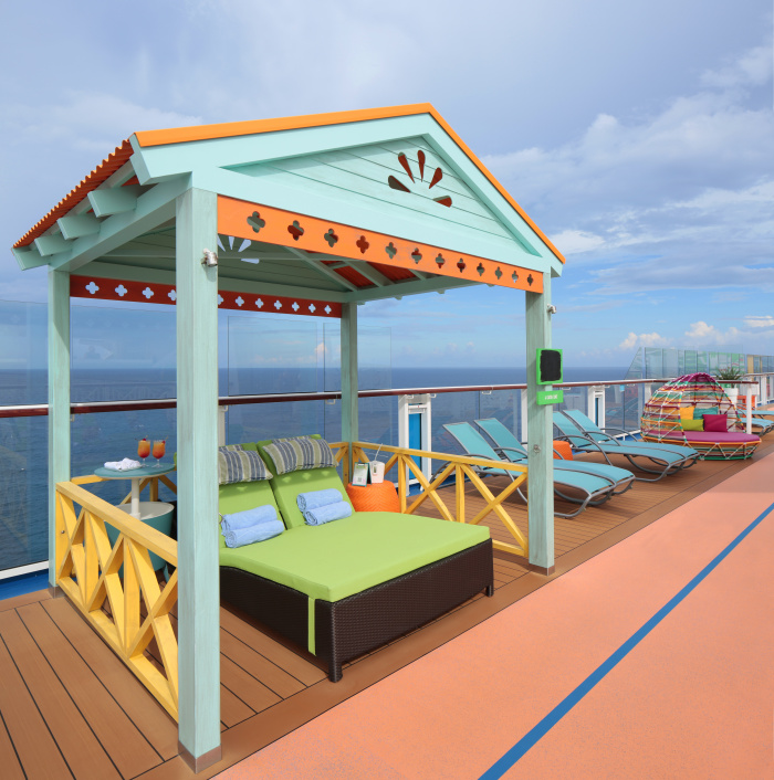 With epic ocean views from every angle, the resort-style Caribbean pool deck on Odyssey of the Seas features laidback casitas. Available by reservation only, these private lounge spots offer seclusion and relaxation. Perks include a welcome mimosa, chilled hand towels, luxury loungers, charging capabilities and a service button that directly calls a dedicated bar server at The Lime & Coconut poolside bar.   