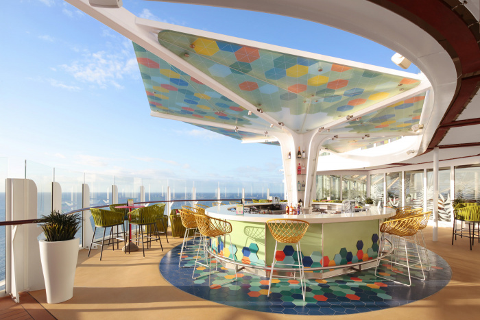 The happiest of happy hours can be had at the new, cantilevered Vue Bar on Royal Caribbean’s Wonder of the Seas. With an array of cocktails, including a signature drink, the poolside hotspot offers panoramic ocean views by day, and after sunset, it shines bright with a colorful mosaic canopy.