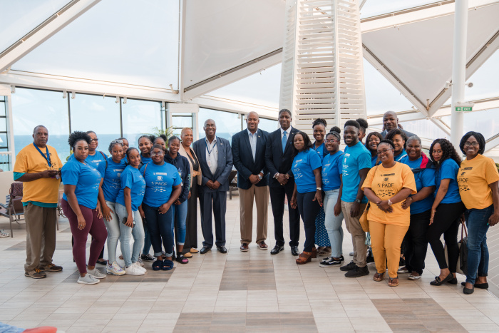 December 2022 – Students and teachers from the STEM for Oceans Camp on Royal Caribbean International’s Wonder of the Seas with (center left to right) Royal Caribbean Group’s Regional Vice President of Government Relations for the Bahamas and Caribbean Wendy McDonald, Minister of State for the Environment Basil McIntosh, Minister of State for the Environment and Natural Resources Vaughn Miller, Minister of State for Education Zane Lightbourne, and STEM Camp Director Martha McFall, before touring the ship.