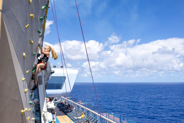 Adventure reaches new heights on the signature rock climbing wall, where families and friends can challenge each other and take in breathtaking ocean views on Ovation of the Seas.