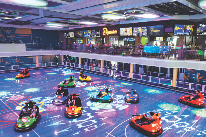 It’s game on for multigenerational families and guests of all ages alike in the next-generation SeaPlex on board Odyssey of the Seas. The two-level largest indoor and outdoor activity complex at sea debuts a Quantum Ultra Class first, Playmakers Sports Bar & Arcade, and features an array of activities. From bumper cars to new and classic arcade games, there’s something for every traveler to enjoy.