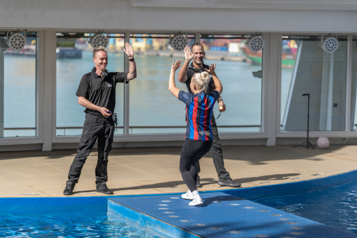 June 2023 – Freestyle football world champion Liv Cooke teams up with Royal Caribbean for her latest world record attempt. Against the awe-inspiring backdrop of the signature AquaTheater on Symphony of the Seas, Liv successfully achieved her seventh title – the “Most Sit-down Alternating Crossovers with a Football in 30 seconds (female).