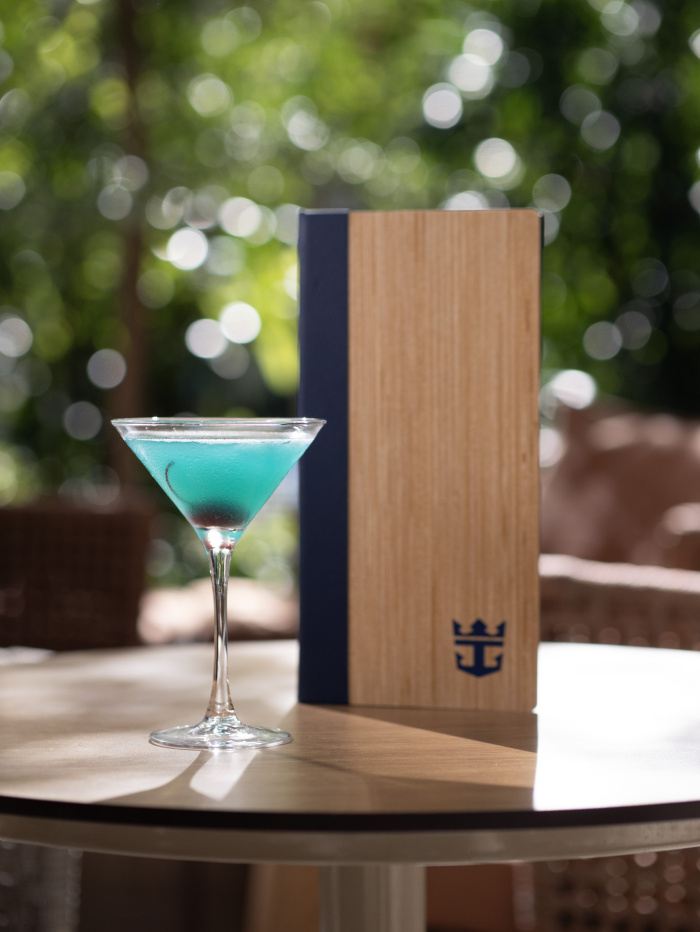 The Curacao Cosmo is among the variety of drinks, from coffee-infused sips to bubbly and zero-proof cocktails, that vacationers can enjoy at Royal Caribbean’s bars and lounges.