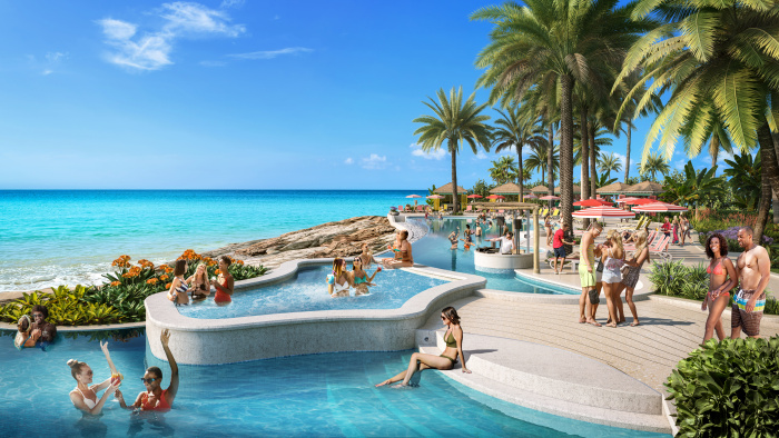 April 2024 – Opening in 2025, Royal Caribbean’s Royal Beach Club Paradise Island will be a 17-acre slice of paradise in Nassau, The Bahamas. At the heart of the ultimate beach day experience will be the culture and people of The Bahamas, and it will feature three stunning pools, two beaches, swim-up bars, private cabanas, spots for bites and drinks, and more.

Abril de 2024 - Inaugurado en 2025, Royal Beach Club Paradise Island de Royal Caribbean será un pedazo de paraíso de casi siete hectáreas en Nassau, las Bahamas. La cultura y la gente de las Bahamas serán el corazón de esta incomparable experiencia de playa, que contará con tres impresionantes piscinas, dos playas, bares en la piscina, cabañas privadas, lugares para comer y beber, y mucho más.
