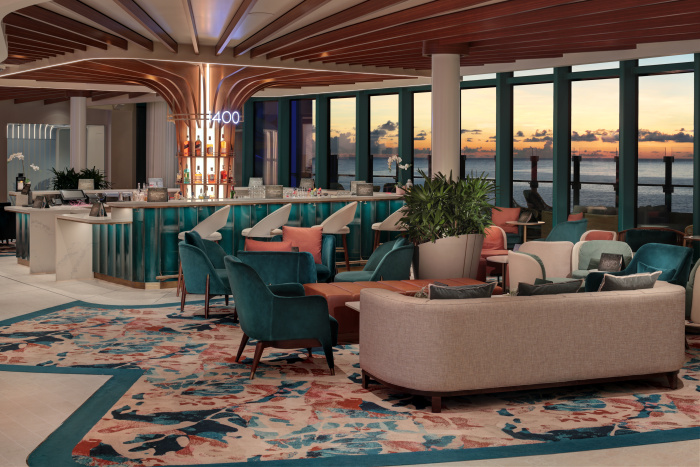 Inspired by the history of shipbuilding, 1400 Lobby Bar on Star of the Seas is the meetup spot on the Royal Promenade and includes an outdoor terrace. Vacationers can enjoy elevated cocktails both day and night. 