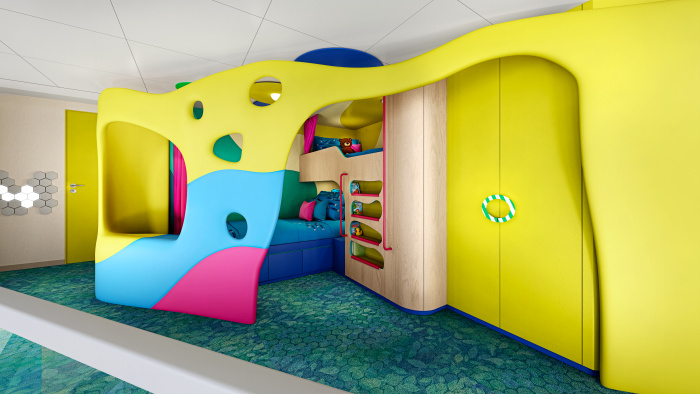 October 2025 – The Ultimate Family Townhouse returns to Legend of the Seas, and the fleet’s most action-packed suite has gotten an upgrade with redesigned spaces for the whole family. Kids can cozy up in their own room with two twin beds or lounge in the lofted bunk, where bunkbeds turn into private forts with a pull of the curtains.Octubre de 2025 – El Ultimate Family Townhouse regresa al Legend of the Seas, y la suite más llena de acción de Royal Caribbean ha recibido una actualización con espacios rediseñados para toda la familia. Los niños pueden acomodarse en su propia habitación con dos camas individuales o descansar en el altillo, donde las literas se convierten en fuertes privados con solo correr las cortinas.
