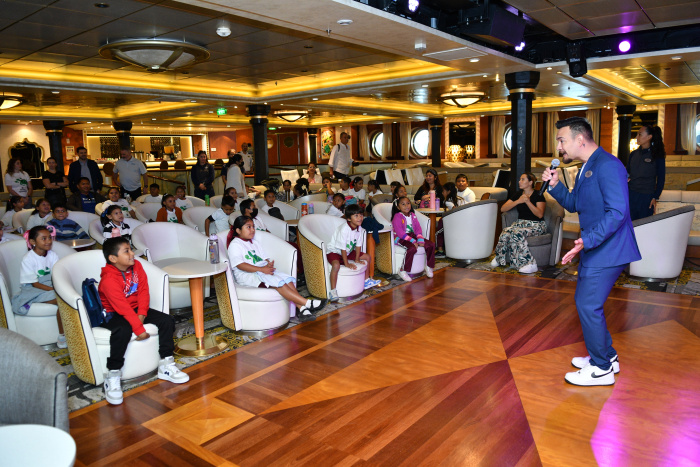 Students in Mahahual, Mexico, take part in Royal Caribbean’s Royal Voyagers Program—an immersive ship-visit experience where nearly 700 local children explored maritime careers, ship operations, and sustainability through guided tours and hands-on learning onboard.